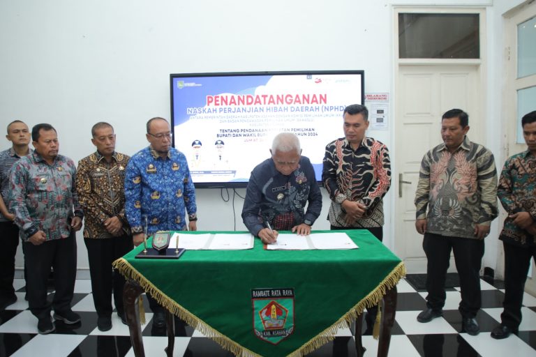 Bupati Asahan Tandatangani NPHD Dengan KPU Kabupaten Asahan