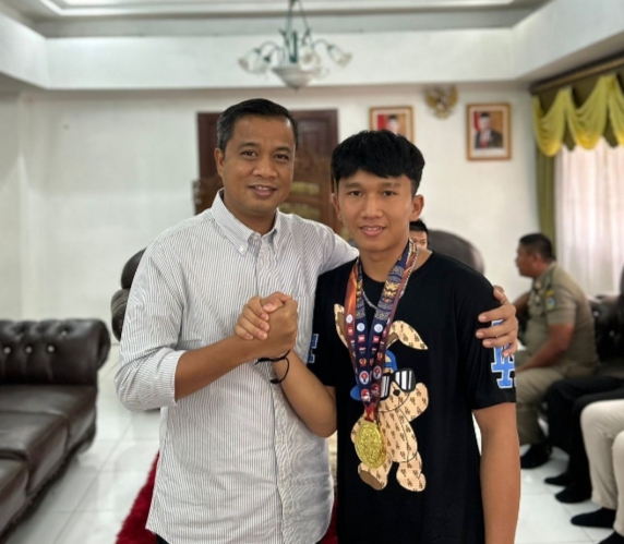 Pj Walikota Tebingtinggi Sambut Atlet Wushu Genea Elyos Silaban