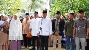 Pj Bupati Langkat Faisal Hasrimy Pimpin Upacara Pelepasan Jenazah Kades Serapuh ABC